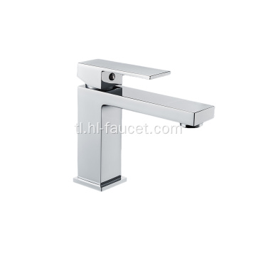 Square bathroom hot and cold basin mixer taps.